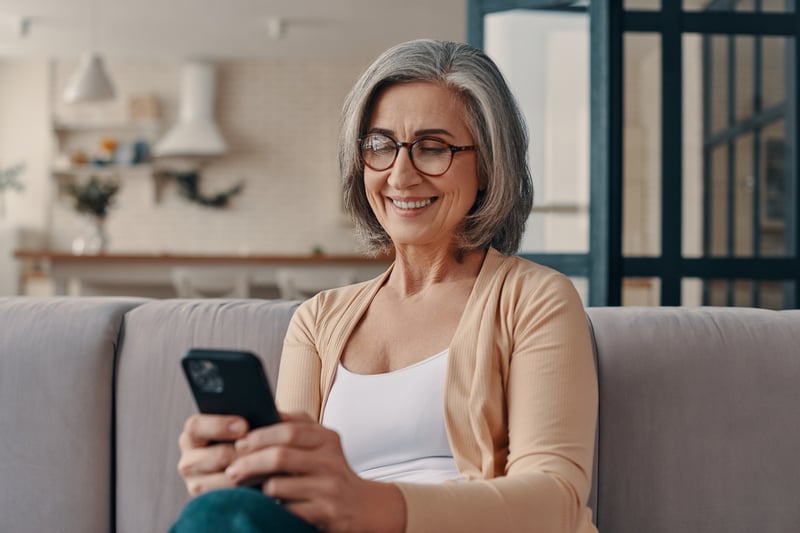 patient engaged on phone between visits