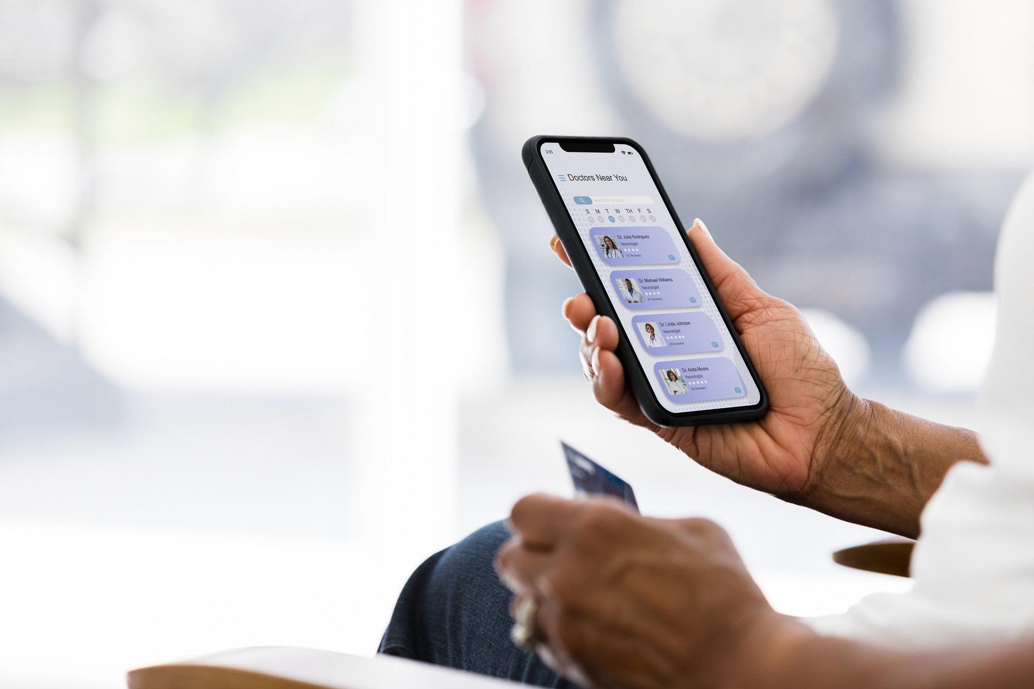 patient checking in using phone